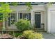 Inviting front door with black shutters and attractive landscaping enhancing curb appeal at 410 Willingham Rd, Morrisville, NC 27560