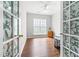 Office space featuring French doors, wood flooring, a chair and natural light at 410 Willingham Rd, Morrisville, NC 27560
