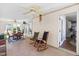 Bright sun room with ceiling fans, chairs and lots of light at 410 Willingham Rd, Morrisville, NC 27560