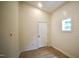 Bright bedroom featuring shiplap accent wall, window, and a modern light wood floor at 416 Everett St, Burlington, NC 27215