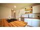 Kitchen with butcher block counters, white subway tile, and open shelving at 416 Everett St, Burlington, NC 27215