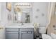 Bathroom with vanity, neutral walls and flooring, and updated fixtures at 4505 Woodlawn Dr, Raleigh, NC 27616