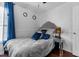 Bedroom with hardwood floors, ample closet space, and neutral paint at 4505 Woodlawn Dr, Raleigh, NC 27616