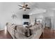 Spacious living room featuring hardwood floors, a fireplace, and an open layout at 4505 Woodlawn Dr, Raleigh, NC 27616