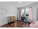 Bright and airy home office setup with hardwood floors and natural light at 4505 Woodlawn Dr, Raleigh, NC 27616