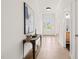 Entryway features clean lines, light hardwood floors, and an open floor plan at 525 Kings Lake Way, Durham, NC 27703