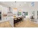 Modern kitchen with a large island, seating, stainless steel appliances, and open layout at 525 Kings Lake Way, Durham, NC 27703