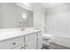 Bright bathroom featuring a large vanity, white cabinets, and a shower-tub combo at 5309 Neuse Wood Dr, Raleigh, NC 27616