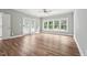Bright bedroom with multiple windows and patio access at 5317 Moonflower Ct, Holly Springs, NC 27540