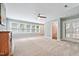Bonus room boasting abundant natural light and ample space for various activities at 5317 Moonflower Ct, Holly Springs, NC 27540