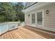 View from the deck showcases direct access to pool, and backyard, blending indoor/outdoor living at 5317 Moonflower Ct, Holly Springs, NC 27540