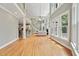 Open concept with lots of natural light, showing living room and bar area at 5317 Moonflower Ct, Holly Springs, NC 27540