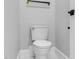 Bathroom featuring a modern toilet and updated fixtures at 5504 Earle Road, Raleigh, NC 27606