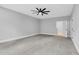 Light and airy bedroom with soft carpet and modern ceiling fan at 5504 Earle Road, Raleigh, NC 27606