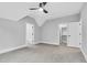 Bedroom features carpet floors, a ceiling fan, an ensuite, and closet storage at 5504 Earle Road, Raleigh, NC 27606
