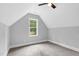 Charming bedroom featuring carpet floors, natural light, and neutral wall color at 5504 Earle Road, Raleigh, NC 27606
