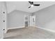 Bedroom boasts carpet floors, a ceiling fan, an ensuite, and closet storage at 5504 Earle Road, Raleigh, NC 27606