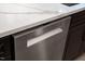 Close-up of a stainless steel Bosch dishwasher with white quartz countertops and custom cabinetry at 5504 Earle Road, Raleigh, NC 27606
