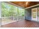 Screened-in back porch with wood ceiling and floors, great for outdoor entertaining at 5504 Earle Road, Raleigh, NC 27606