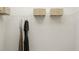 A white closet with hanging clothes and shelving at 5545 Cayden Cove Dr, Wendell, NC 27591