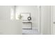 Hallway with console table, decor, and plenty of natural light from the window at 5545 Cayden Cove Dr, Wendell, NC 27591