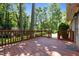 This deck offers space and a great view of the surrounding treed yard at 5617 Partridge Ln, Raleigh, NC 27609