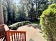 Inviting brick patio with lush greenery, offering a peaceful outdoor retreat at 5617 Partridge Ln, Raleigh, NC 27609