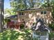 A gazebo and a wooden deck are highlights of this home's expansive backyard at 5617 Partridge Ln, Raleigh, NC 27609