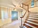 Traditional entryway features wooden stairs and a chandelier at 5617 Partridge Ln, Raleigh, NC 27609