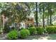 Beautiful brick home with manicured landscaping and mature trees at 5617 Partridge Ln, Raleigh, NC 27609