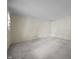 Spacious living room with neutral carpet and walls, offering a versatile living space at 5617 Partridge Ln, Raleigh, NC 27609