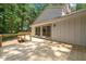 Spacious wooden deck with railing and sliding glass doors, perfect for outdoor enjoyment at 5709 Russell Rd, Durham, NC 27712