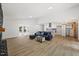 Open-concept layout features an island, luxury vinyl floors and natural light at 5709 Russell Rd, Durham, NC 27712