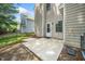 View of the backyard featuring a concrete patio and privacy fence, offering a perfect space for outdoor activities at 6008 River Lake Cir, Raleigh, NC 27604