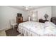 Bedroom featuring a bed, ceiling fan, and natural light, offering a tranquil retreat at 6008 River Lake Cir, Raleigh, NC 27604