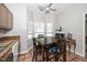 Bright eat-in kitchen featuring a large bay window, tile floors, and cozy dining area at 6008 River Lake Cir, Raleigh, NC 27604