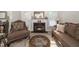 Inviting living room with a cozy fireplace and traditional decor provides a warm atmosphere at 6008 River Lake Cir, Raleigh, NC 27604