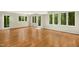 Basement featuring hardwood floors with direct access to the backyard at 623 Totten Pl, Chapel Hill, NC 27514