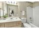 Well-lit bathroom with a shower-tub combo and a classic vanity at 623 Totten Pl, Chapel Hill, NC 27514