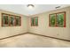 Bedroom with hardwood floors and natural light from the windows at 623 Totten Pl, Chapel Hill, NC 27514