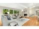 Living room featuring hardwood floors and a fireplace at 623 Totten Pl, Chapel Hill, NC 27514