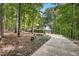 Home on a wooded lot with mature trees and a long driveway at 623 Totten Pl, Chapel Hill, NC 27514
