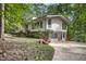 Two story home featuring multiple windows and a side entry door at 623 Totten Pl, Chapel Hill, NC 27514