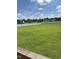 Expansive backyard with lush green grass and a white fence creating a private and peaceful outdoor space at 644 Wall Rd, Wendell, NC 27591