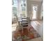 Dining area with lots of natural light, a table, seating for four, and access to a patio at 644 Wall Rd, Wendell, NC 27591