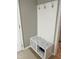 Mudroom area with bench seating and hooks for storage at 644 Wall Rd, Wendell, NC 27591