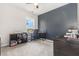 Cozy bedroom with a dedicated study area, perfect for work or creative projects at 664 Old Dairy Dr, Wake Forest, NC 27587