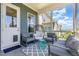 Inviting screened porch featuring stylish seating and a comfortable, relaxed atmosphere for outdoor enjoyment at 664 Old Dairy Dr, Wake Forest, NC 27587