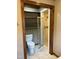 Full bathroom featuring tile floors, toilet and glass-door shower at 759 Wheeler Dr, Angier, NC 27501