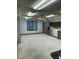 Large bonus room with built-in shelving, lots of lights and plush carpet at 759 Wheeler Dr, Angier, NC 27501